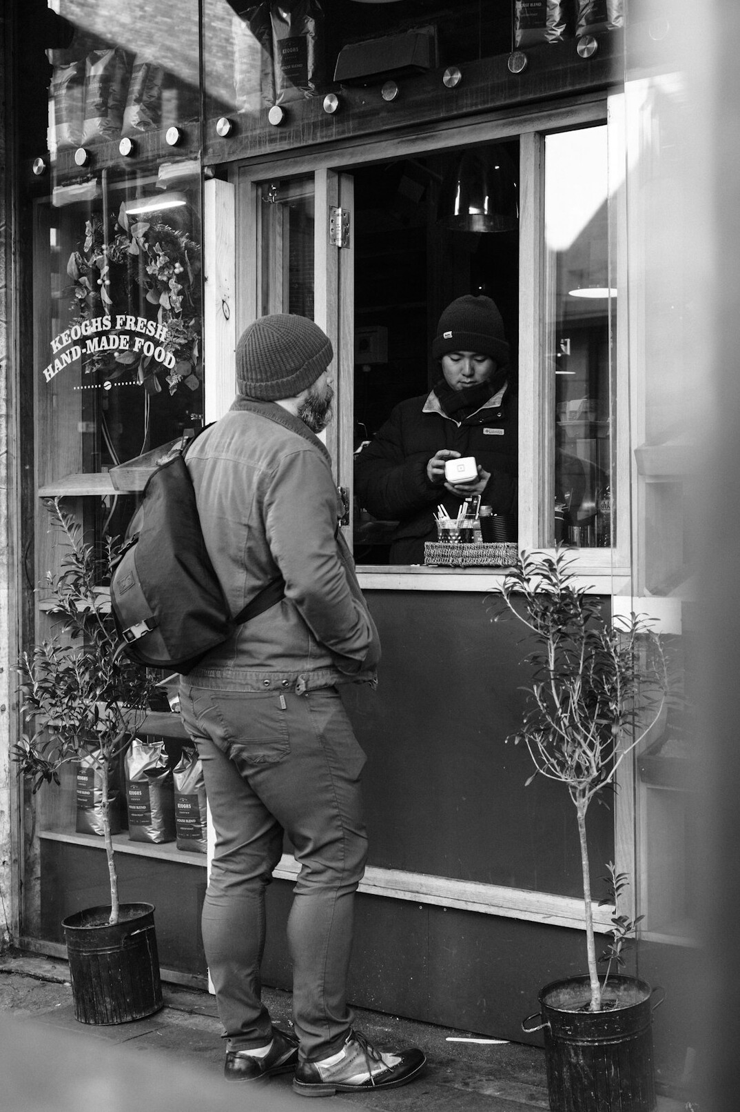detective apprehending thief in store