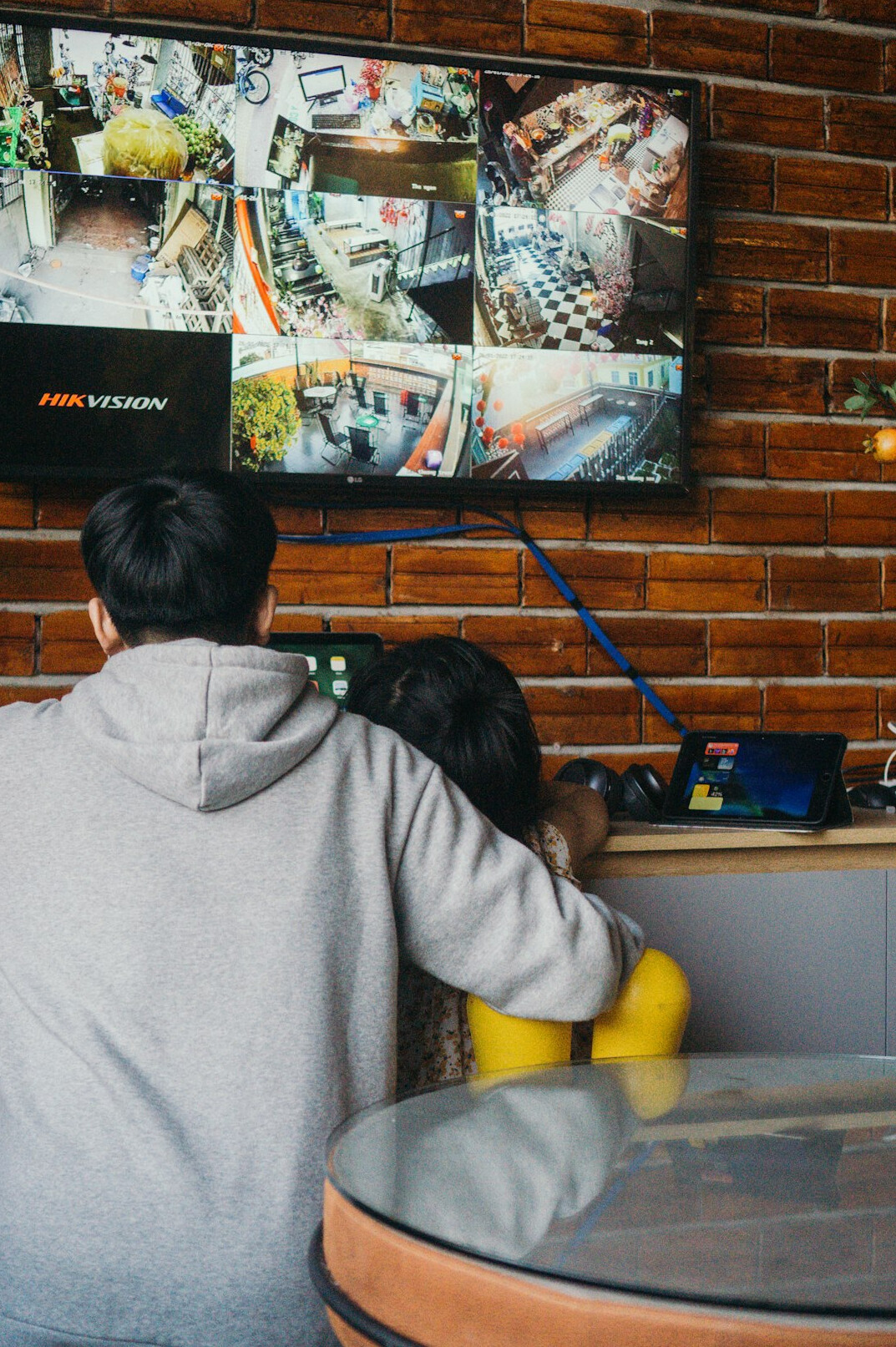 store manager reviewing security footage