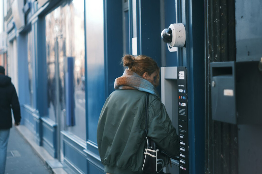 store detective watching surveillance